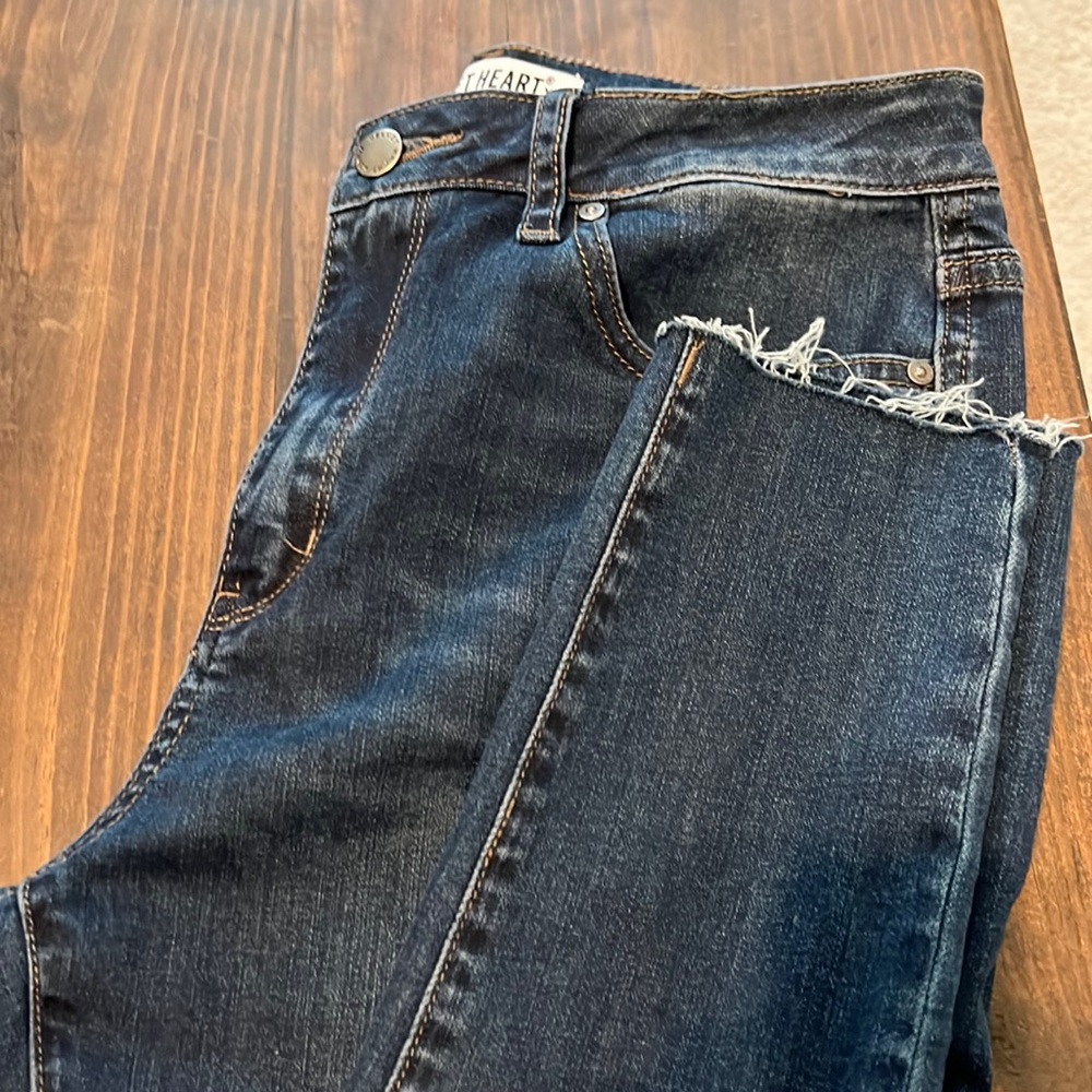 Brand new velvet heart skinny jeans. Raw hem.